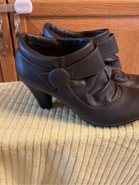 Covington Black Faux-Leather High Heel Ankle Boots with Button Strap